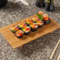 Sashimi Roll Chef Special · Tuna, salmon, yellowtail, imitation crab, masago, asparagus, and scallion.