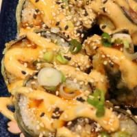 Sushi Bomb Chef Special · Tuna, salmon, snapper, avocado, asparagus, scallion, and roe. Tempura style.