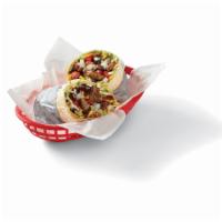 Fajita Beef Burrito · Fajita chicken, guacamole, shredded cheese, tomatoes, onions, garlic sauce and your choice o...