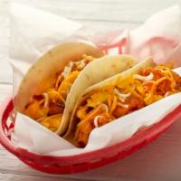 Chorizo, Egg and Cheese Breakfast Taco · Chorizo, egg and cheese served on a flour tortilla.