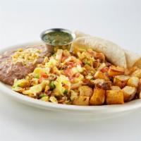 Beef Chilaquiles · 2 scrambled eggs, seasoned ground beef, tortillas strips, shredded cheese, and pico de gallo...