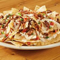 Shredded Chicken Nachos · Fresh tortilla chips topped with shredded chicken, shredded cheese, queso, pico de gallo, fe...