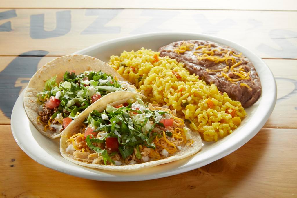Taco Plate · Choose any 2 tacos with your choice of 2 sides.