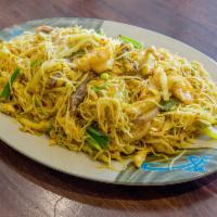 56. Singapore Chow Mein Fun · Curry flavor. Served with thin rice noodle. Spicy.
