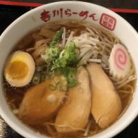 Chicken Shoyu Ramen · Light soy sauce and chicken broth with wavy egg noodle topped with chicken, bamboo shoot, be...