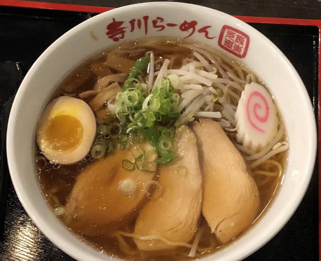 Chicken Shoyu Ramen · Light soy sauce and chicken broth with wavy egg noodle topped with chicken, bamboo shoot, bean sprout, scallion, fish cake and seasoned boiled egg.