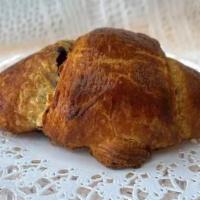 Chocolate Croissant · A classic buttery, flaky pastry with a chocolate filling. 