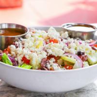 Team Greece Salad · Diced tomato, Kalamata olive, red onion, cucumber, feta cheese and romaine lettuce served wi...