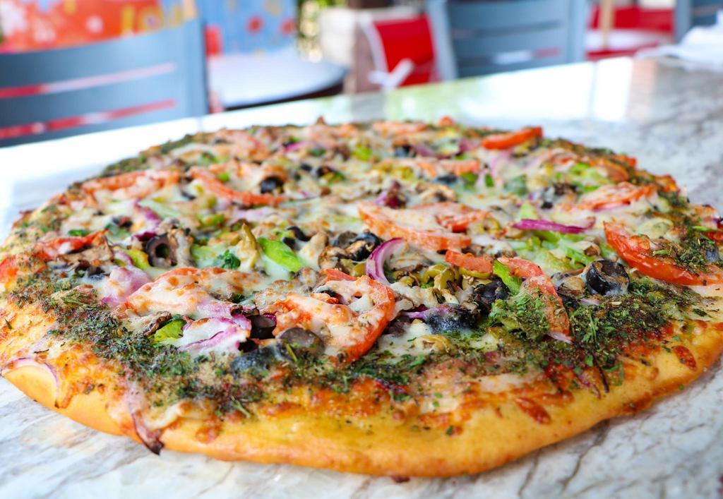 Touch Down Pizza · Pepperoni, sausage, ham, beef, tomato, black olive, green olive, bell pepper, onion and mushroom.