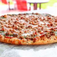 Carnivore Pizza · Pepperoni, ham, sausage, bacon and beef.