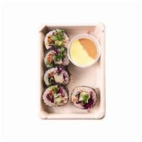 Veggie Sushi Roll · Nori, quinoa and rice, pickled ginger, wasabi, red sauerkraut, turmeric onions, marinated to...