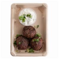 Veggie Balls · Beet and superseeds balls served with spread.
 Contains : onion, corn, pea protein, cucumbe...