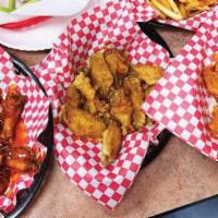 20 and 30 Wings Special · Served with box of french fries, and 1/2 gallon tea. Served with 3 dressings and celery stic...