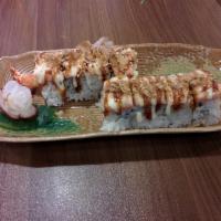 Awesome Roll · Shrimp tempura, imitation crab, avocado, & cucumber roll topped w/ salmon, eel sauce, & dyna...