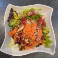 Sashimi Salad · spring mix w.sashimi tobiko, seasame seed on the top,w.yuzu sauce