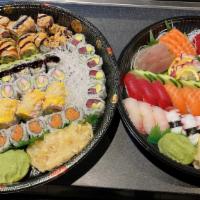 Party Tray C (Party for 4) · Chef's choice of 26 pieces sashimi,18 pieces Sushi,5maki roll,3 special roll.