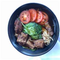 B2. Taiwn Beef Brisket Tomato Noodle with Soup · Beef, brisket, tomato, pickled cabbage, green onion and cilantro.