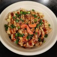 Karaage Rice Bowl · Japanese fried chicken, umami gravy, seaweed, scallions, sesame seed and pickled red radish.