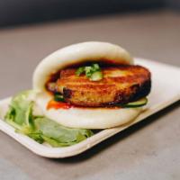 Pork Bun · Braised pork belly, hoisin, Sriracha, cucumber and scallions.