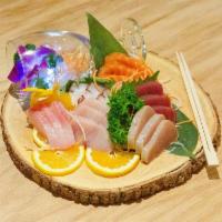 B5. Sashimi Deluxe · Chef choice of 18 pieces assorted sashimi. 