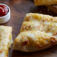 Cheese Breadsticks · With melted 3 cheese blend (200 cal/stick).