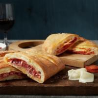 Pepperoni Calzone · Extra pepperoni and Wisconsin cheese blend.
