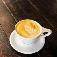 Golden Milk Tea Lattes · House golden paste unfused with turmeric, spices, and organic agave, steamed milk.