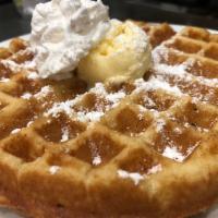 Belgian Waffle · Served with butter, whipped cream, and powdered sugar.