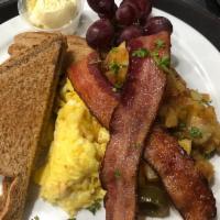 Rise & Shine · Two eggs any style, bacon or maple link sausage and your choice of toast. Yukon gold country...