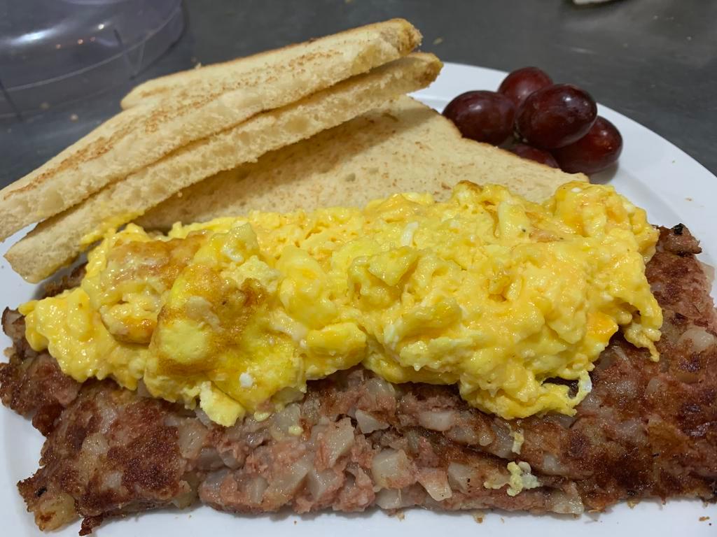 Corned Beef Hash · Traditional crispy corned beef hash topped with eggs any style. Served with white or wheat toast