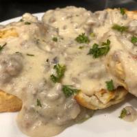 Homemade Sausage Gravy & Biscuits · Country style biscuits smothered with homemade sausage gravy