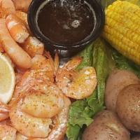 1 lb. Shrimp  · Sweet White Gulf Shrimp lightly Seasoned with Old Bay & butter. Steamed & served with corn o...