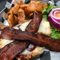 Grilled Chicken Sandwich · Grilled chicken breast topped with Applewood bacon, tangy BBQ, and Swiss cheese with lettuce...