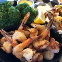 Shrimp Dinner · Fried or grilled. 10 jumbo butterflied Gulf shrimp, cooked to order. Served with 2 choice si...