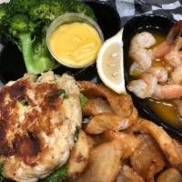 Seafood Combo · 1 broiled Jumbo Lump Crabcake and 5 sweet Gulf shrimp in lemon butter Scampi sauce. Served w...