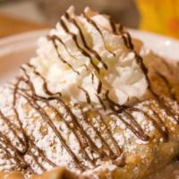 Chocolate Lover's Crepe · Chocolate Brownies with Chocolate Fudge, Bananas, Ice Cream and Whipped Cream