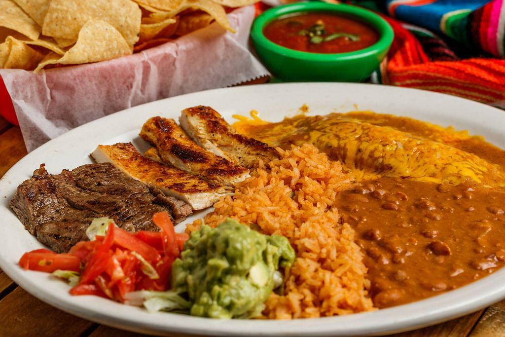 Tex-Mex Combo · Chicken and beef fajita steak, served with 1 cheese enchilada, rice, beans, guacamole and tortillas. 