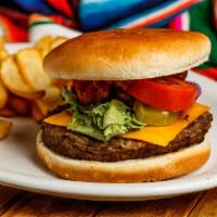 Texas Burger · 1/2 lb. Angus beef patty, mayo, onions, tomatoes and lettuce. Served with french fries. Add ...