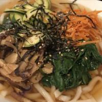 Udon Noodle Soup · Thick white wheat noodles served hot
in a savory broth with mushrooms.
Topped with nori and ...