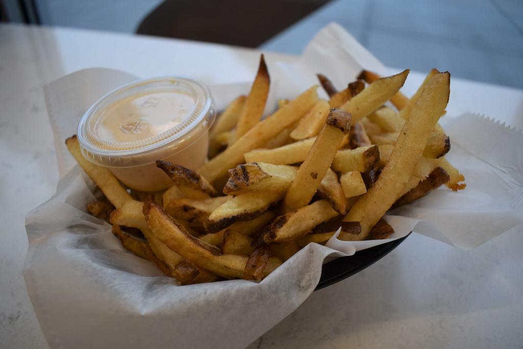 Regular Fries · Salted and served with a lighthouse dipping sauce. Fried in peanut oil.
