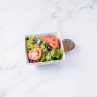 House Salad · Romaine lettuce, tomatoes, cucumbers and red onions.