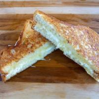3X Grilled Cheese Sandwich · Blended white cheddar, swiss and goat cheese pressed on 3/4 Sour Dough bread.