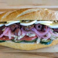Tuna Nicoise (Pan Bagnet) Sandwich · Albacore tuna, tomatoes, hard boiled egg, olives, pickled onions and cucumber with dijon  vi...