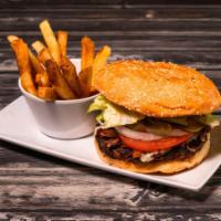 Vaquera Burger · Clasico burger topped with arrachera steak, cheese, fresh avocado, grilled  onions and chori...