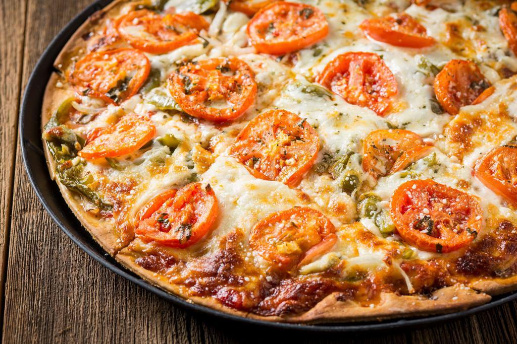The Veggie Pizza · Mushroom, onion & green pepper with tomato on top. Vegetarian.