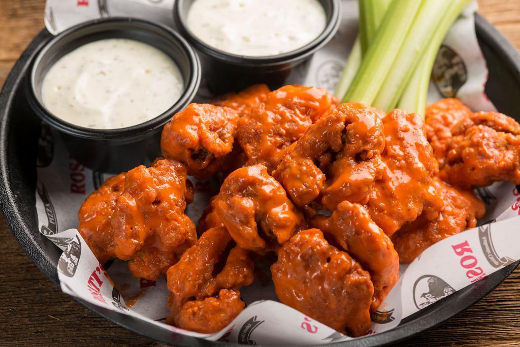 Boneless Wings · Tossed in the sauce of your choice and served with choice of dressing.
