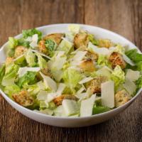 Caesar Salad · Crisp romaine lettuce hearts, toasted garlic croutons, and hand-shaved Asiago cheese served ...