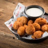 Breaded Mushrooms · Served with ranch dressing.