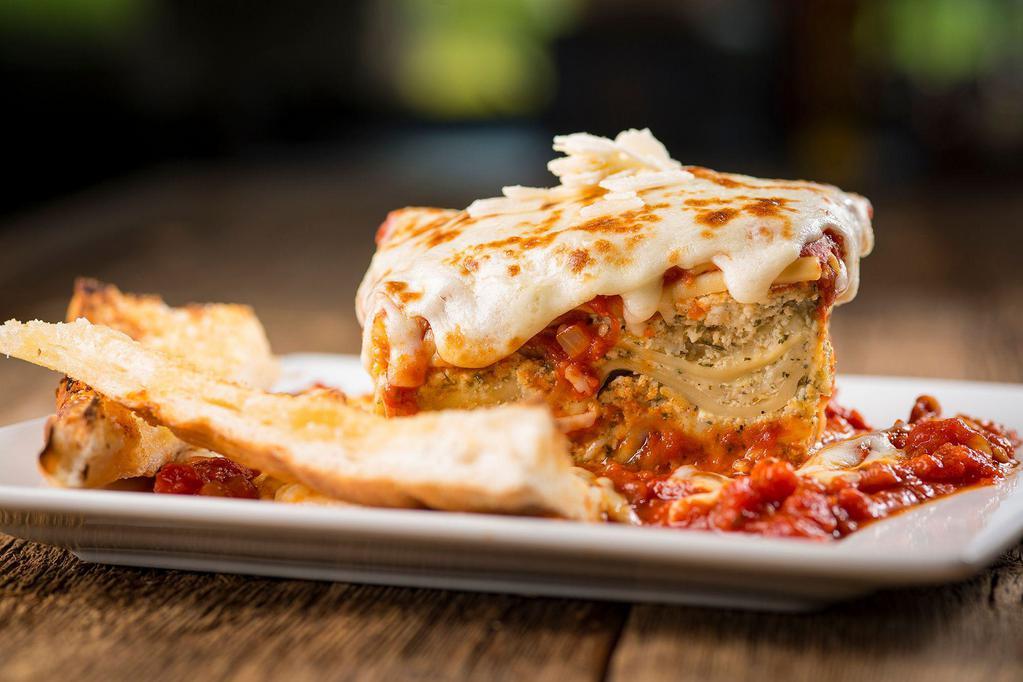 Lasagna · Serves 1-3. Homemade from the family recipe: layers of ribbon noodles and 3 cheeses, smothered in marinara sauce, topped with baked mozzarella cheese and fresh parsley. Served with a side of garlic bread and Romano cheese.