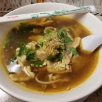 F2. Chicken Noodle Soup · Noodles with slice chicken breast in clear chicken broth.